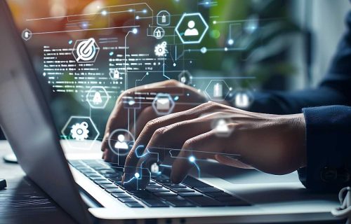 businessman-working-laptop-modern-office-with-double-exposure-binary-code (1)