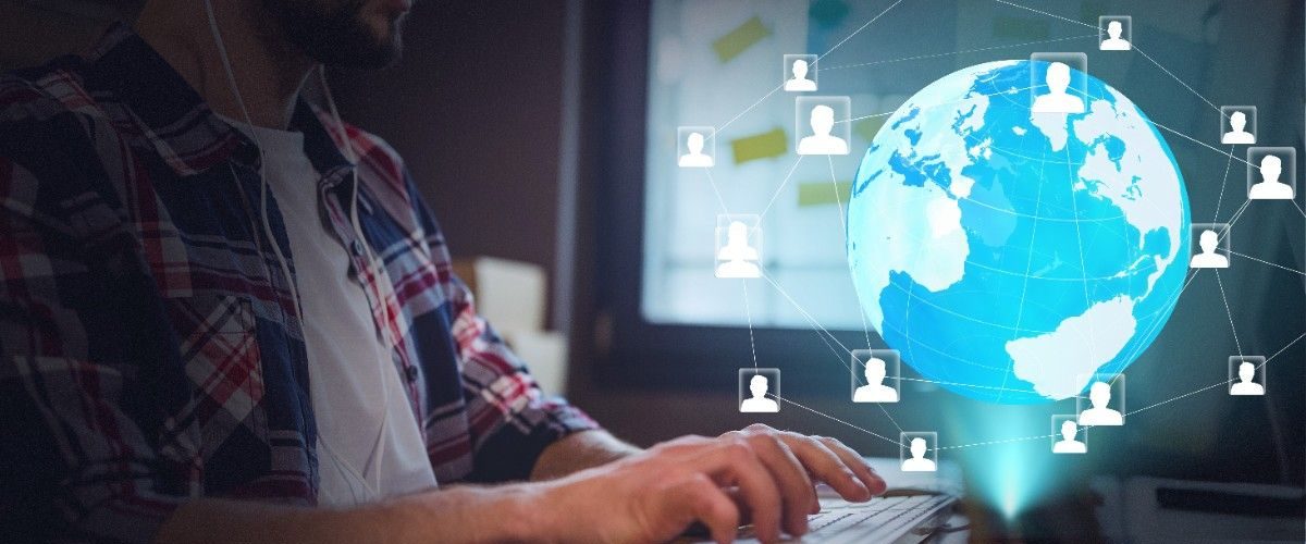 network-profile-icons-globe-against-mid-section-man-using-computer-office (1)